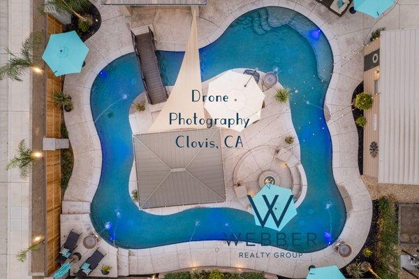 The perfect opportunity to show off this unbelievable Clovis home and its Lazy River using our drone photographer.