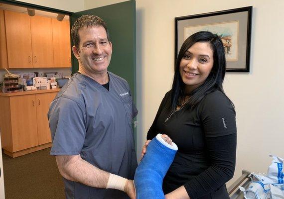 Dr. Eric Feit and assistant Alex after casting my foot.