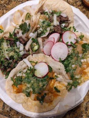 Carne asada and chicharron tacos