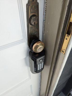 Maybe putting your lockbox on an antique door handle isn't a great idea