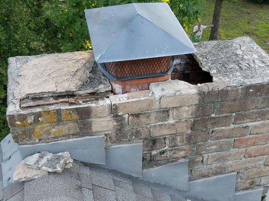 Time to restore this chimney...strong brick got you.