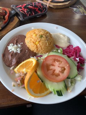 Rice,refried beans and salad