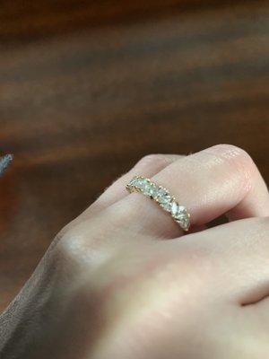 Wedding band with marquise and round diamonds in gold setting