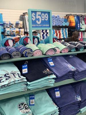 False Advertising. See signage noted items are 5.99 when purchasing 3 or more. Store clerk noted hat/tee combination not listed