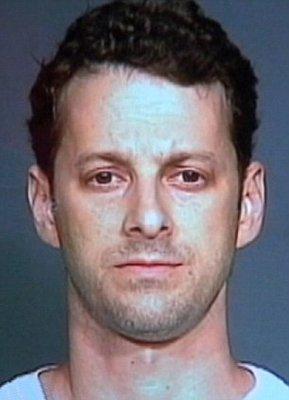 Dr. Adam Levinson Mug shot. Arrested for filming up a lady's skirt on a NY subway.