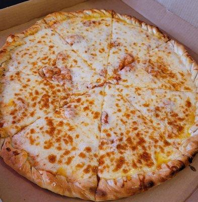 Beautiful full pie of cheese pizza. Take a look at that nice knotted crust and ooey gooey cheese.