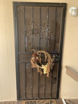 Before:  Rusted old screen door.