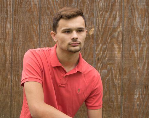 Senior photos, turned professional headshots. all it takes is a simple background and  a pretty day. This was done in a backyard!