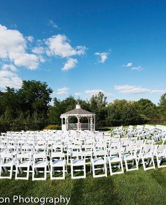 The gazebo set for an outdoor wedding