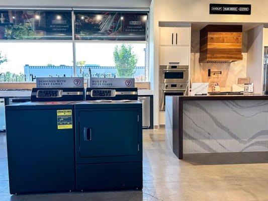 Speed Queen Laundry, Cambria Quartz, Custom Hood, Grothouse wood accent on kitchen island