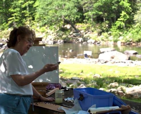 Plein air painting down by the water by Shenandoah Art Destination student