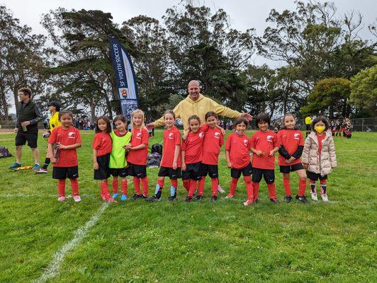 Fireballs 2nd grade girls soccer team. Game day. Beach Chalet offers coaching service for school teams.