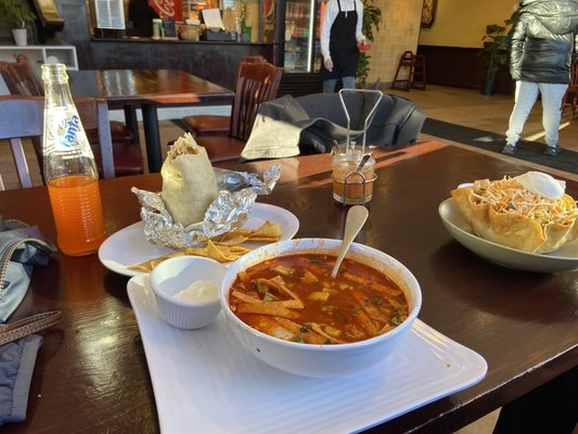 Carnitas Burrito in the back, chicken tortilla soup, and taco salad.