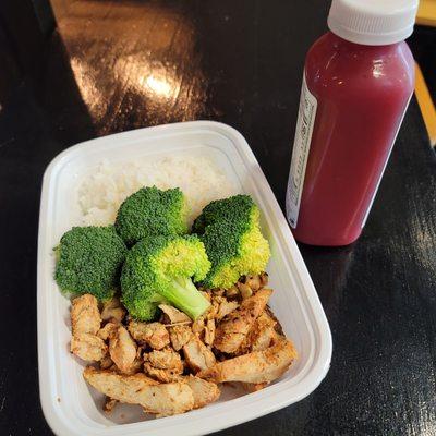 Chicken breast and cold pressed juice.