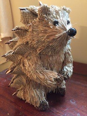 cute porcupine figurine represents Acupuncture