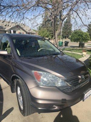 My 2010 Honda CR-V that really needed new paint on the hood and roof. But some body shop magic gave the old paint new life.