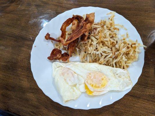 Old school - eggs over easy, bacon and hashbrowns