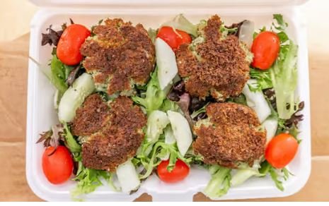 Falafel Salad:

A Veggie Delight
Falafel over Spring Salad topped with homemade taziki Sauce (white Sauce)