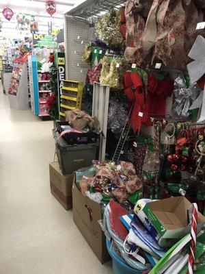 Seasonal aisle...Even after the reorganization of the layout this store is still a cluttered mess!