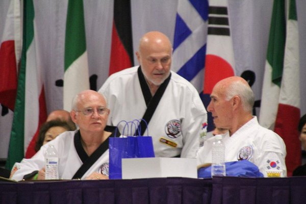 Master Gordon pictured with Grandmasters Beaudoin and Strong as "MC" for the World Championship.