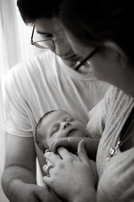 New parents with their baby boy in pulsart media's studio