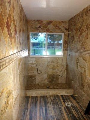 Travertine Stone Tiled Bathroom and Porcelain Floor Tile Planks