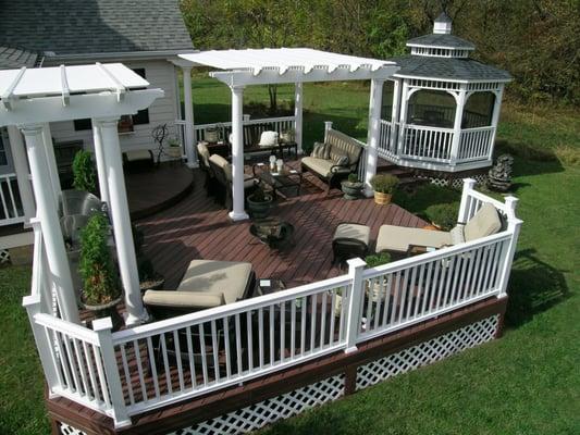 Fiberon composite deck with vinyl pergolas and vinyl gazebo located in Greene county outside Xenia, Ohio.