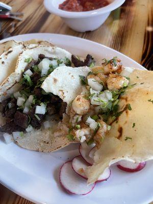 Close-up shrimp and steak tacos with the pallet cleansing radish