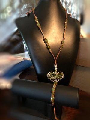 Recent custom set with wire-wrapped heart shape tree of life and macrame leather necklace and bracelet. Beautiful peridot gemstone beads!