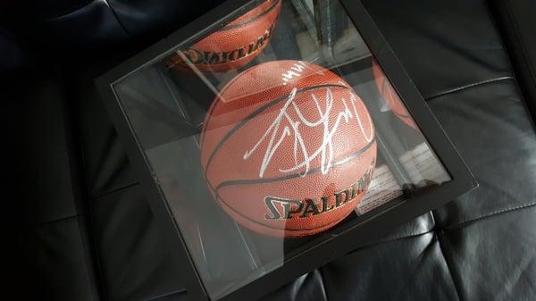 Great Atmosphere and wonderful selection of sports memorabilia. Check this Autographed Dennis Rodman basketball in case. Wow.