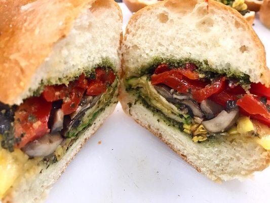 Our Roasted Veggie Sandwich-Pesto, sweet peppers, zucchini, yellow squash, Cremini mushrooms on Challah buns!