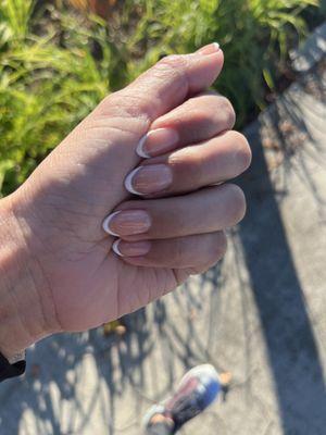 French mani with thin lines, almond shaped. By Gigi.