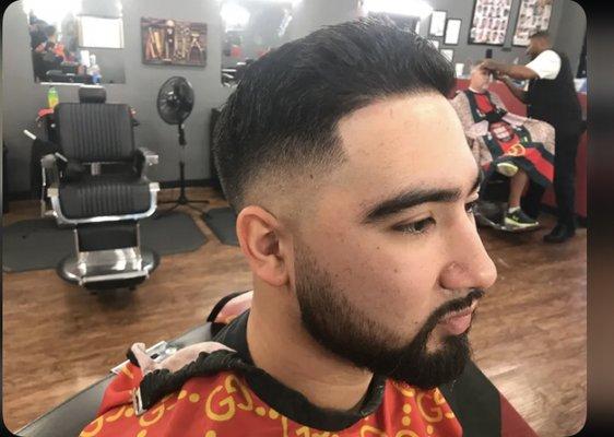 Medium Bald-fade with shears on top, along with mustache & beard