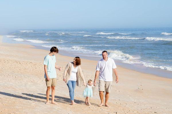 Family walking on the beach at Guana Preserve near Jacksonville, FL