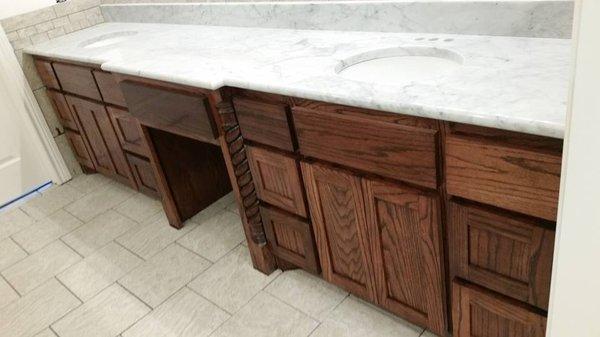 Custom cabinets and marble vanity top