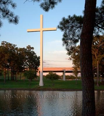 Photo of the cross at the street entrance to the church.