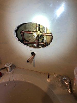 2) opened wall and installed shower valve