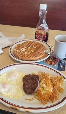 Trad platter saus hash browns eggs O/M Has toast did not have toast because today is waffle Wed anything over 6 bucks free waffle. Cawfee