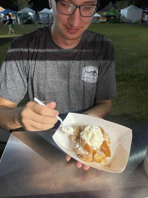 Digging in on the peaches and cream funnel cake!!