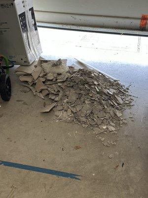 Tiles left in my garage for me to clean up.