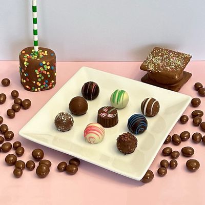 I arranged my various chocolates (marshmallow, s'more, raisins, and truffles)