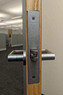 Installation of commercial door handle and lock.