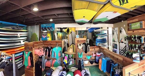 Standing just inside the front entrance of Paddle Planet. This shop is full of premium stand up paddleboards!