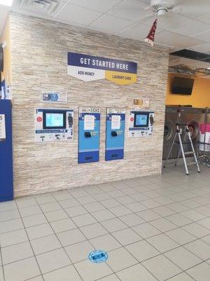 Step 1: Come to the Kiosk to load money on an existing laundry card or purchase a new one.