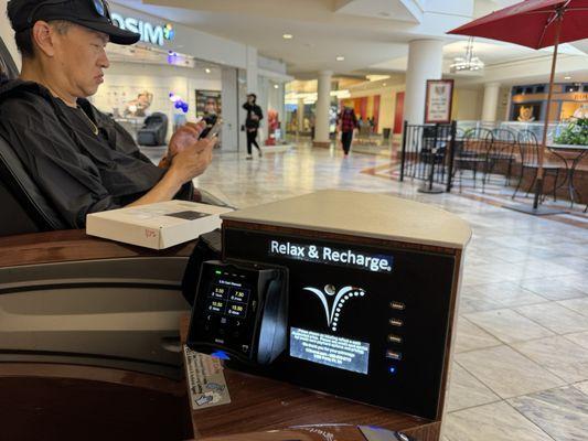 Massage chairs pay station