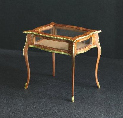 Brass mounted Vitrine table circa 1800 with glass top and sides and ormolu on cabriole legs