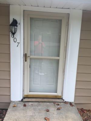 Front door and frame, one of the most obvious items to repair on the house was simply painted over.  The storm door does not latch at all.