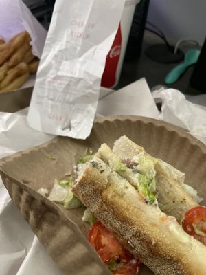 Cheeseburger sub with mold on the roll.