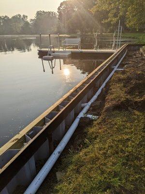 Seawall During Construction with a beautiful morning picture.