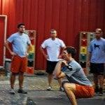 Owner-Operator, Joel Hargett demonstrating a barbell thruster before class.